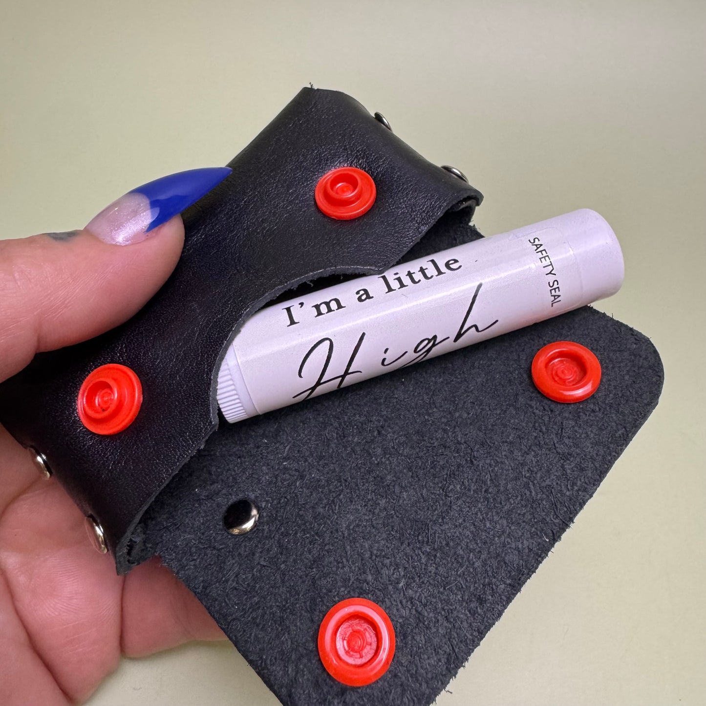 Suzy leather pouch with Honey flavor lip conditioner.