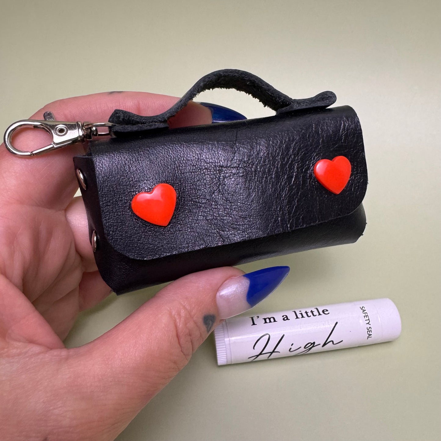Suzy leather pouch with Honey flavor lip conditioner.