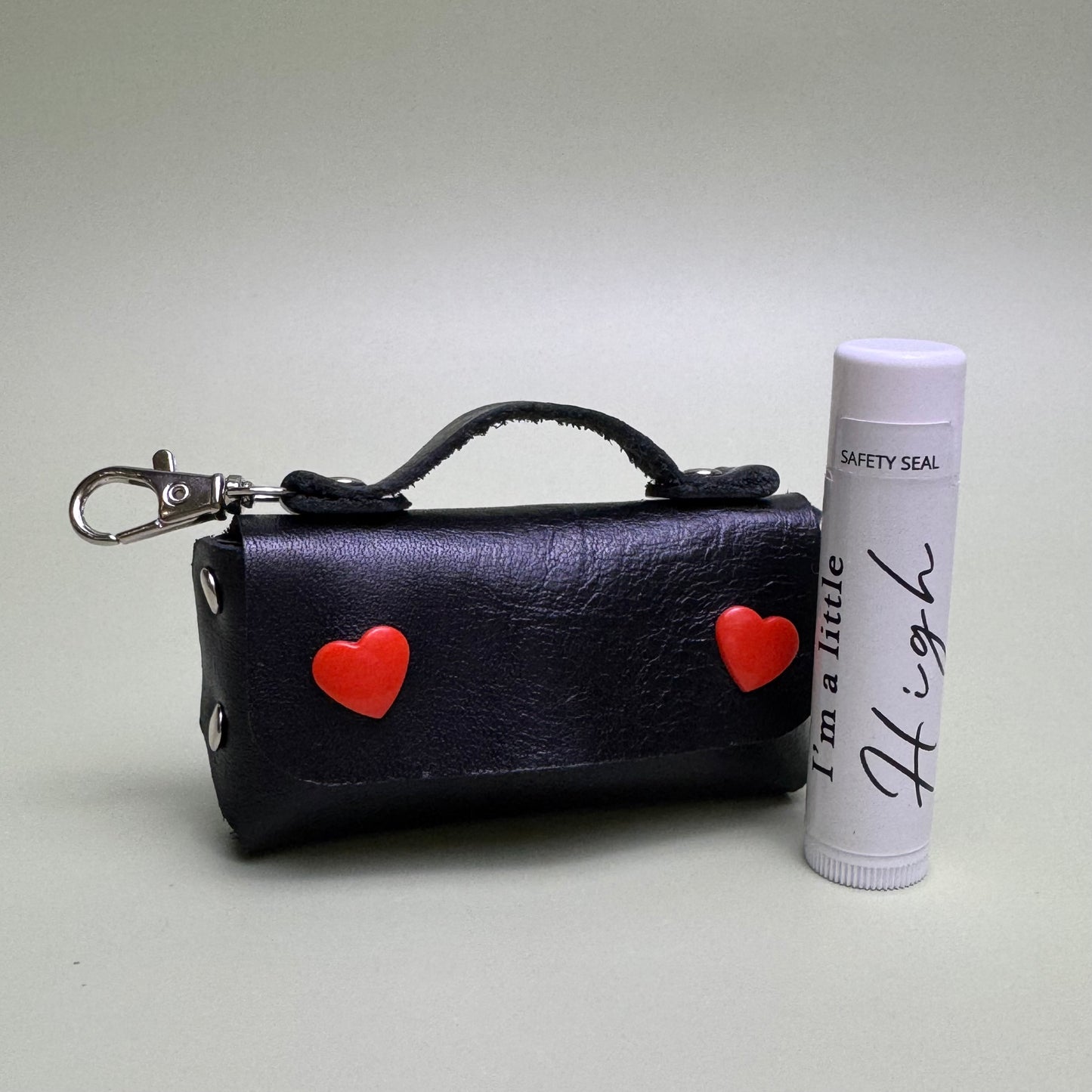 Suzy leather pouch with Honey flavor lip conditioner.