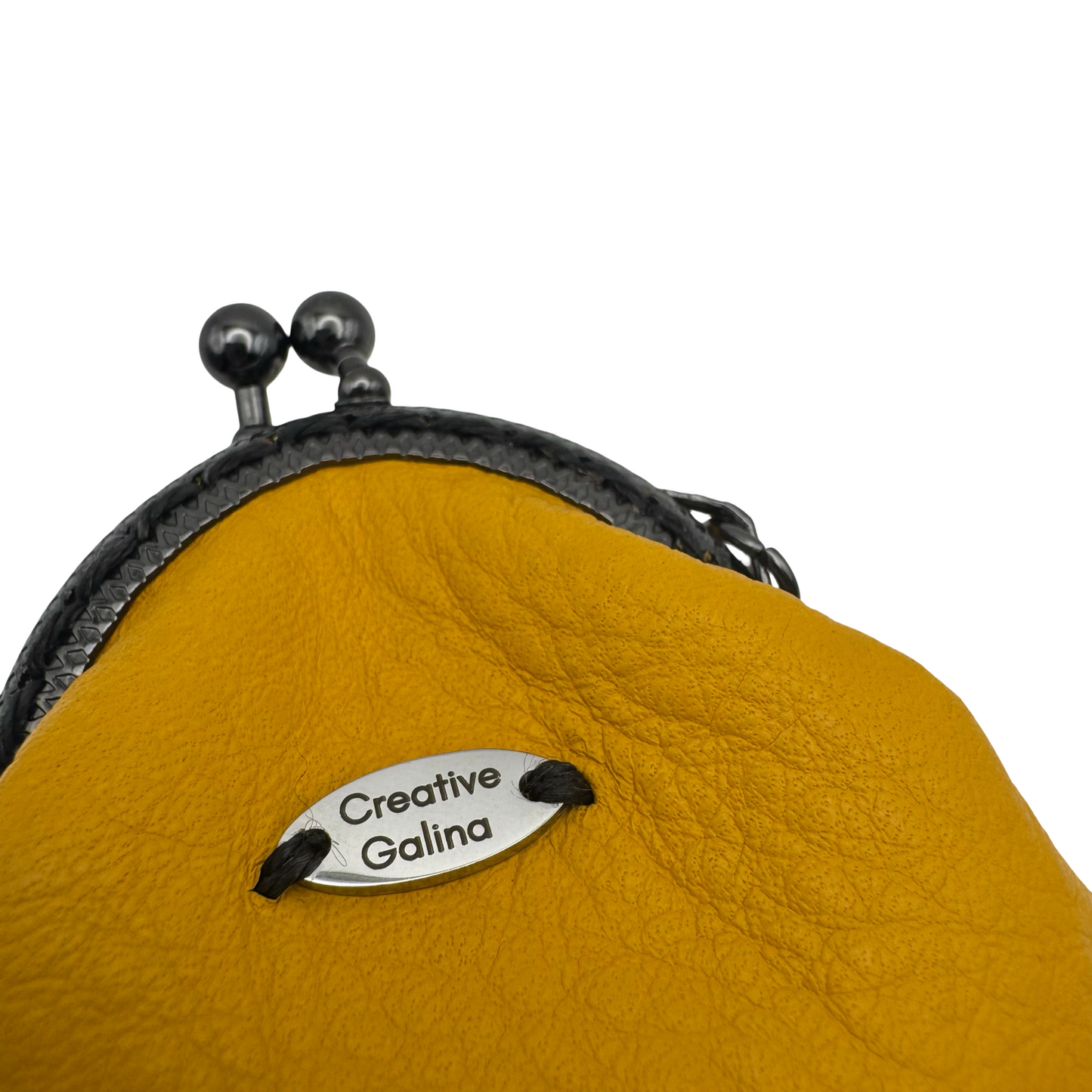 Protective eye leather pouch in Yellow with Heart Selenite crystal.