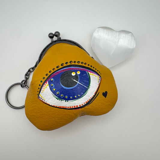 Protective eye leather pouch in Yellow with Heart Selenite crystal.