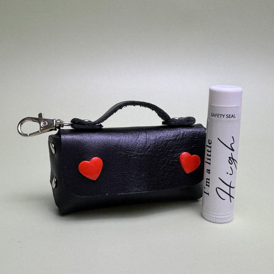 Suzy leather pouch with Honey flavor lip conditioner.