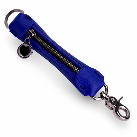 Purse strap extender for lip conditioner.