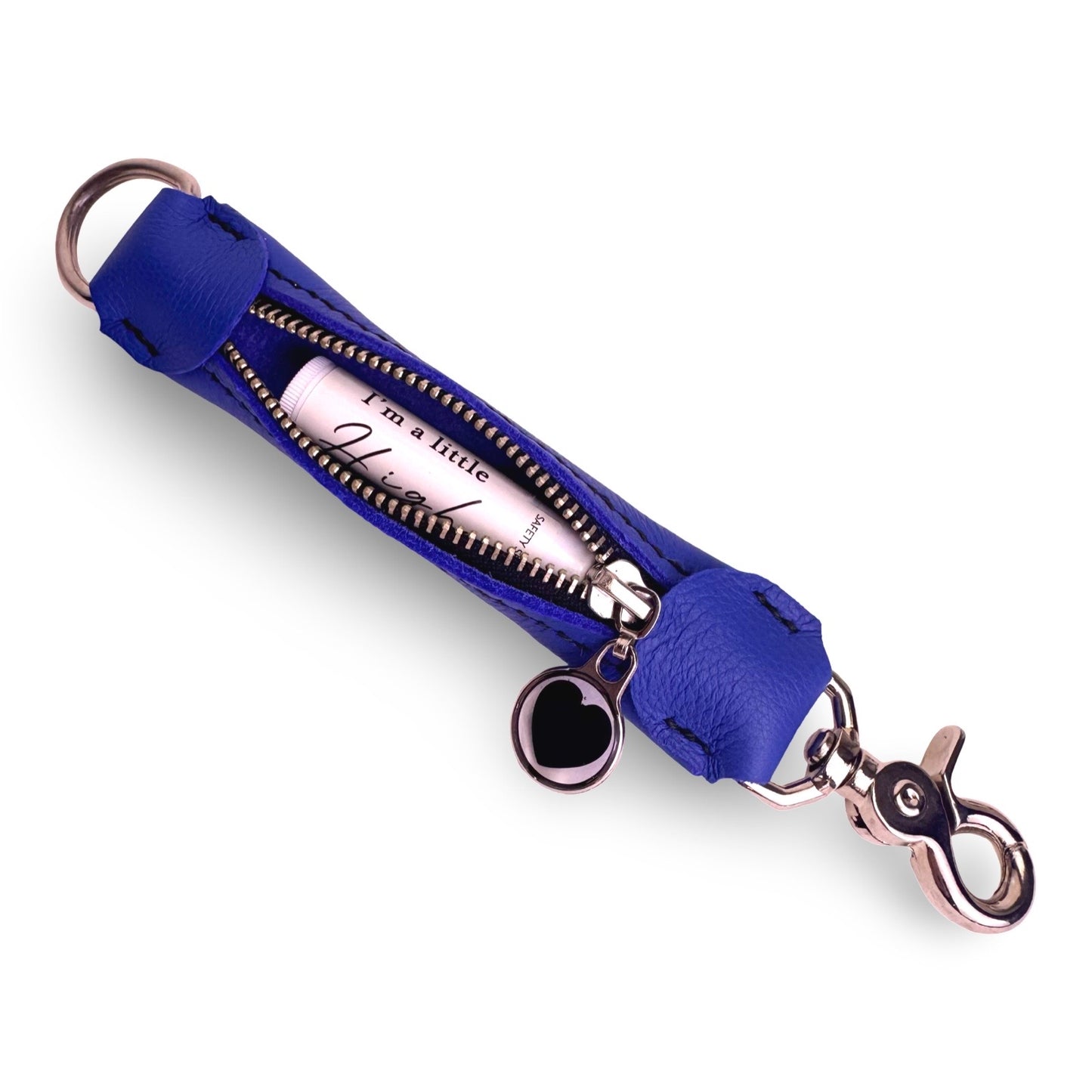 Purse strap extender for lip conditioner.