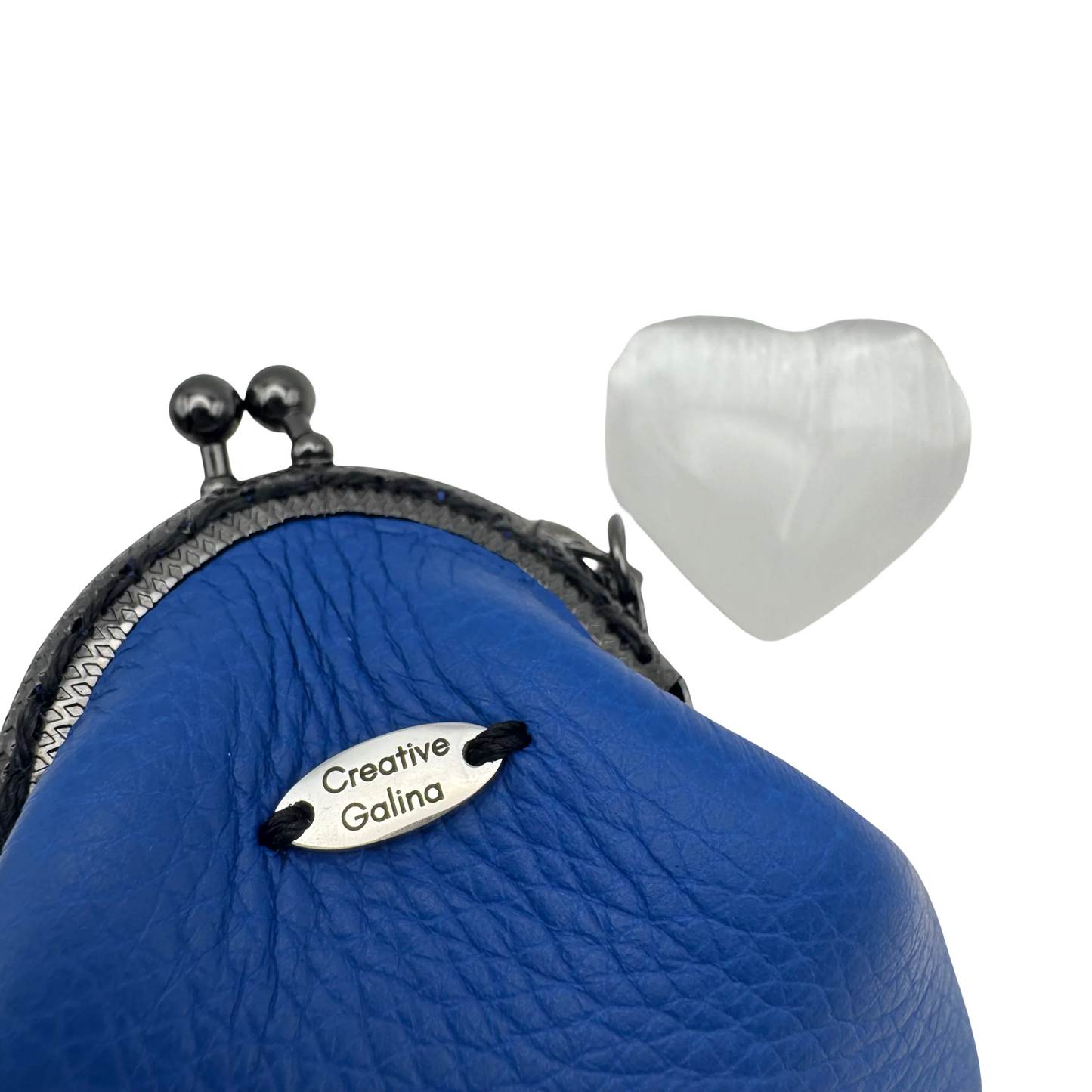 Protective eye leather pouch in Blue with Heart Selenite crystal.