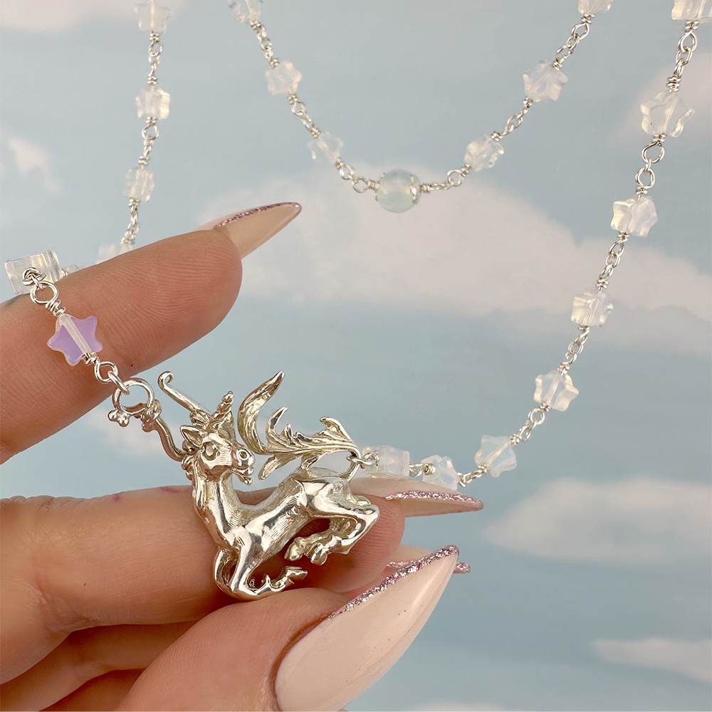 Unicorn on Opalight Stars Necklace.